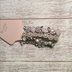 Free with purchase over $25 Silver tone bracelets